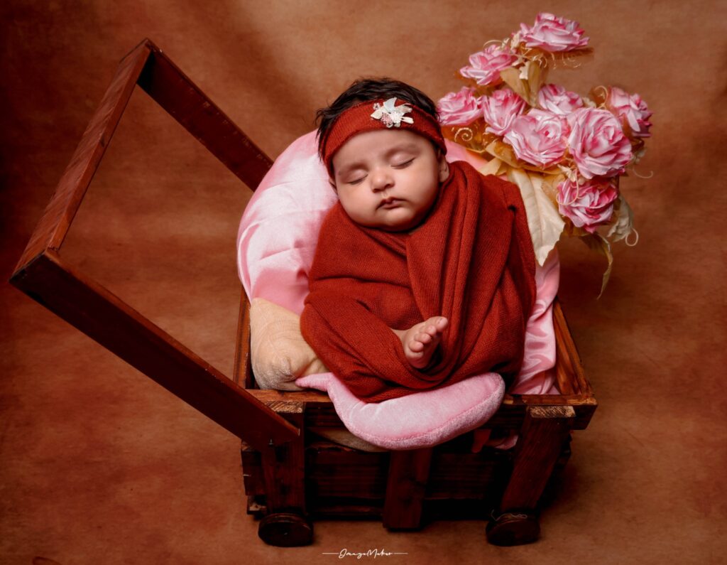 Newborn Baby Red Wrap Portrait