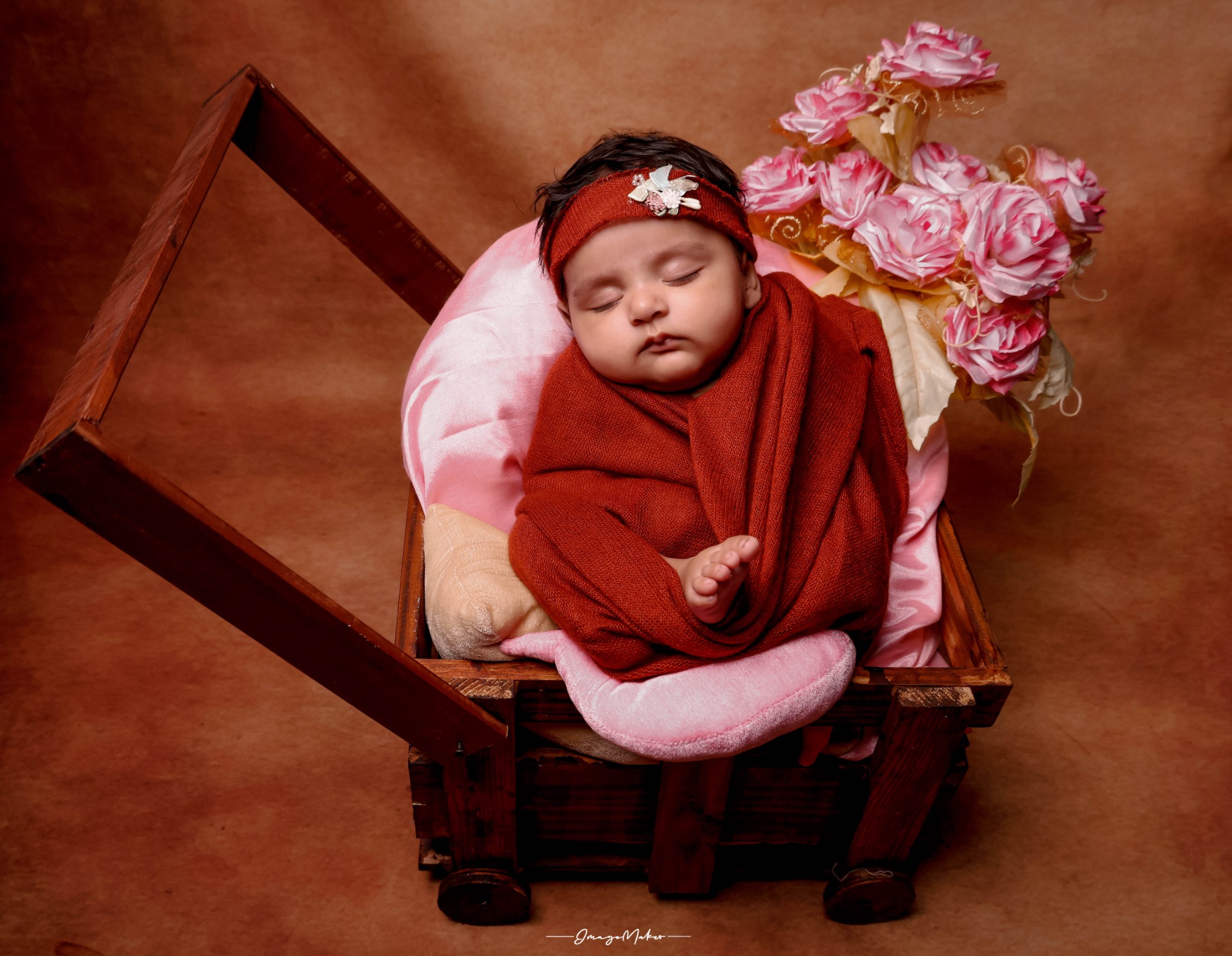 Newborn Baby Red Wrap Portrait